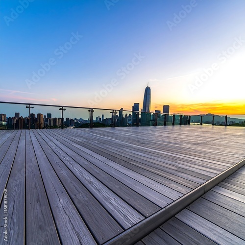 Rooftop deck overlooking city at sunrise
