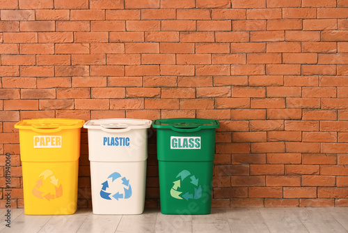 Empty trash bins for differ...