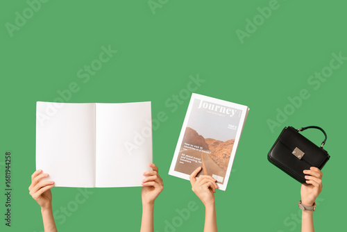 Female hands with magazines...
