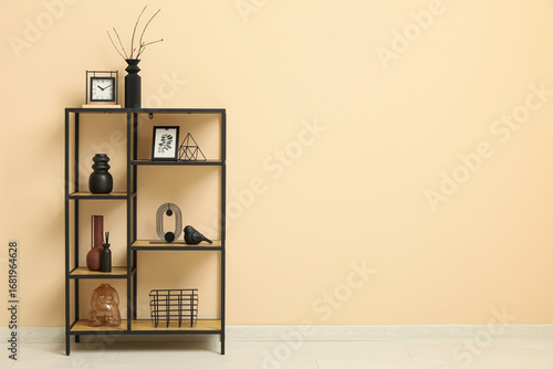 Black shelf unit with styli...