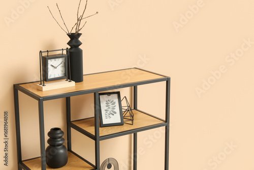 Black shelf unit with styli...