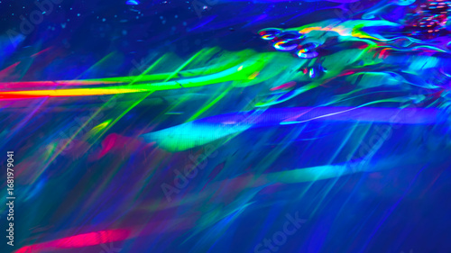 Abstract holographic neon waves, colorful rainbow liquid lights, vibrant glowing psychedelic background