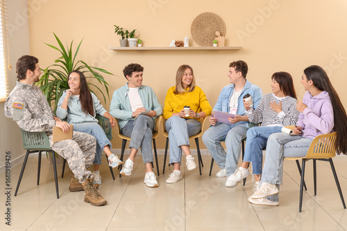 Young people with coffee cu...
