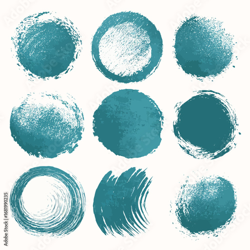 Set of nine teal grunge circular brush strokes with varied painted textures and swirls.