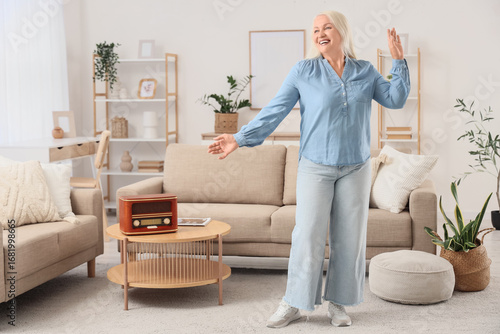Senior woman with retro rad...