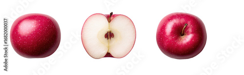 Three whole and sliced crimson apples against a black background