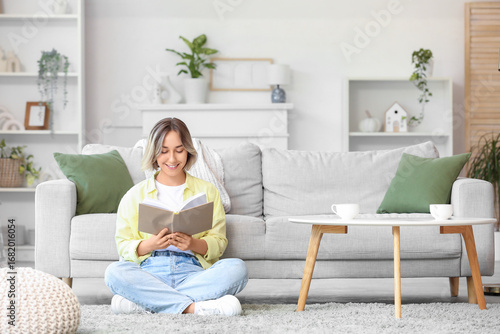 Beautiful woman reading boo...