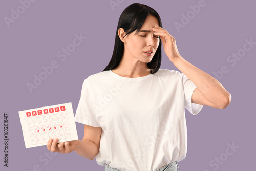 Young woman with headache a...