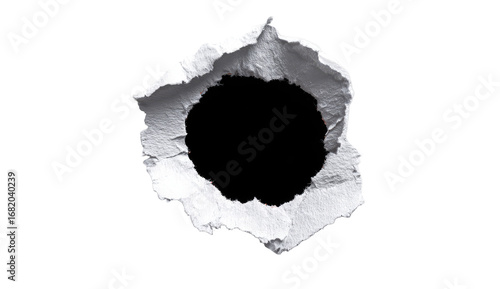 Circular hole punched through white material.  Rippled edges
