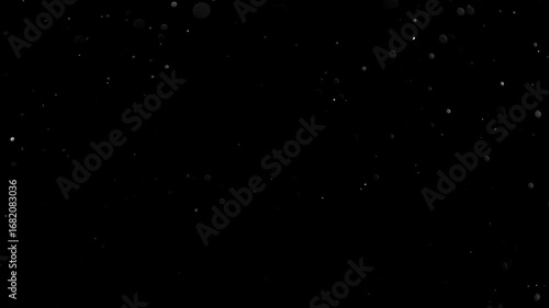 Natural Organic Dust Particles Floating On Black Background. Glittering Sparkling Particles Randomly Spin In The Air With Bokeh. Dynamic Particles With Fast And Slow Motion. Shimmering Dust In Space.	