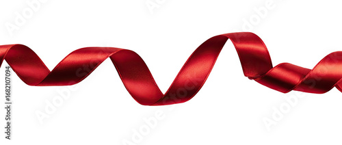 A vibrant crimson ribbon curls elegantly against a black backdrop