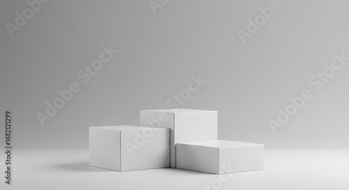 A minimalist 3D render of three white cubic podiums arranged in a stepped formation on a clean white surface against a soft grey background ideal for product placement and awards ceremonies