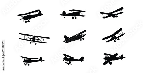 Silhouetted Biplane Airplanes Set Against a Clean White Background Displaying Aviation History.