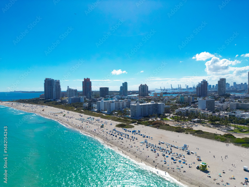 Naklejka premium Miami Beach skyline. Aerial drone shot of the Miami Beach. Aerial view of South Pointe Park and South Beach in Miami Beach. Miami skyline on a summer day.