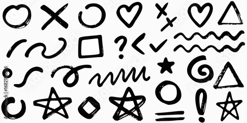 Collection of hand drawn black brush stroke doodles and symbols on a white background