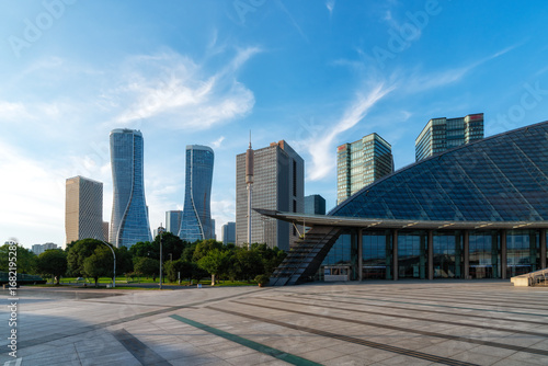 Modern city skyline with contemporary buildings under a clear blue sky