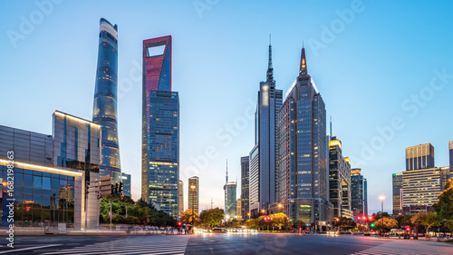 Modern city skyline with tall skyscrapers under clear sky