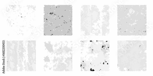 Eight abstract grayscale textured backgrounds with varying patterns and densities of speckles and smudges