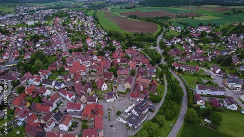 Aerial view of the old town city Ötisheim in Germany on a late sunny day in summer. 