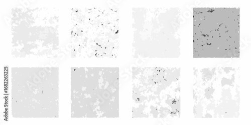 Collection of eight abstract textured backgrounds with varying shades of gray and speckled details