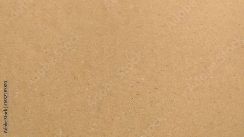 Background of brown kraft paper or cardboard texture, Brown recycled paper texture background.