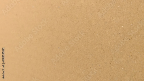 Background of brown kraft paper or cardboard texture, Brown recycled paper texture background.