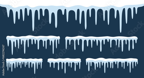 Collection of frozen icicles hanging down from snow covered ledges against a dark blue background winter theme