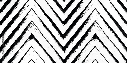 Bold black chevron pattern with a distressed texture on a white background