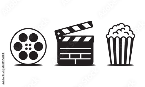 A Trio of Cinematic Icons Film Reel Clapperboard and Popcorn Bucket Representing the Movie Experience and Entertainment