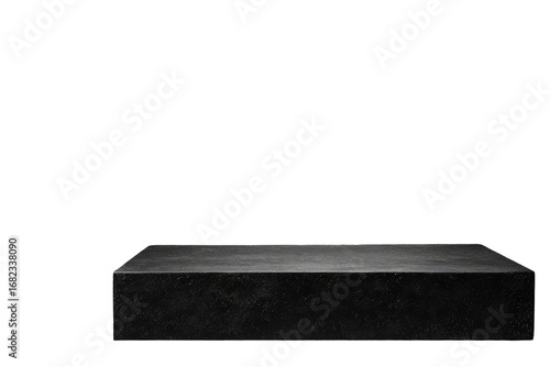Dark, textured, rectangular, stone platform against a black background.  A simple, minimalist, product display