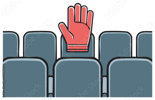 Red foam finger raised in a row of empty stadium seats for sports event