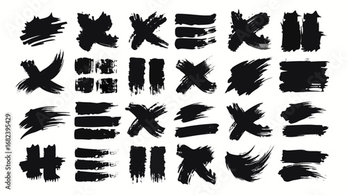 Collection of black brush stroke marks and symbols