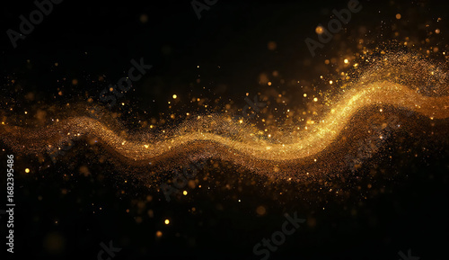 Golden glitter particles on black luxury background