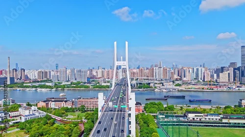 4K real time Aerial view of NanPu Bridge and Huangpu river in Shanghai.