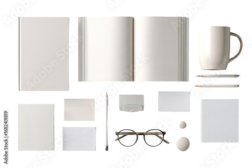 Flat lay of various stationery items, including open notebook, pens, pencils, mug, cards, and glasses