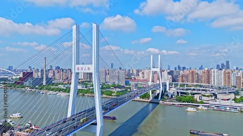 4K real time Aerial view of NanPu Bridge and Huangpu river in Shanghai.