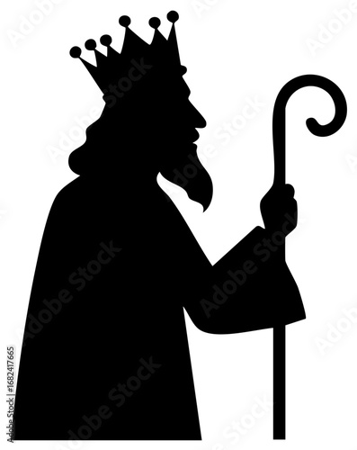 Wise Man Silhouette Standing with Staff and Crown for Nativity Scene Depiction in Black and White
