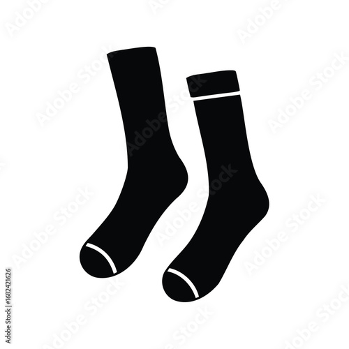 A pair of black socks with white stripes on a white background
