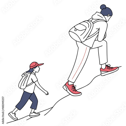 People climbing uphill with backpacks hiking