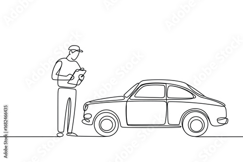 Mechanic inspects vintage car with clipboard