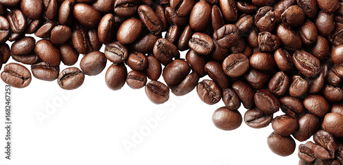 Close-up of many coffee beans, piled and cascading