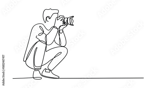 Artist s sketch of a photographer crouching and taking a photo