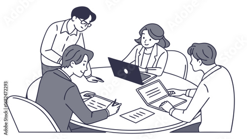 Business people collaborating around a table with laptops and documents business meeting