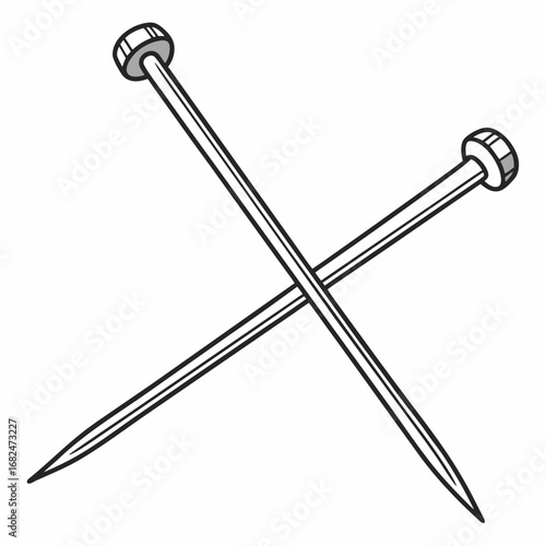 Crossed knitting needles with silver stoppers craft hobby