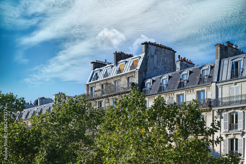Fototapeta Naklejka Na Ścianę i Meble -  Paris, beautiful buildings, view from the coulee verte Rene-dumont in the 12th district, footpath
