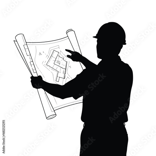 Silhouette of a construction worker engineer pointing at a blueprint