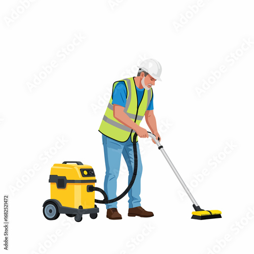 Man in safety vest and hard hat uses a yellow vacuum cleaner to clean a floor, with the vacuum beside him.