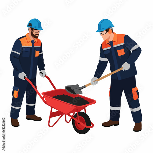 Two construction workers loading dark material into a red wheelbarrow with shovels.