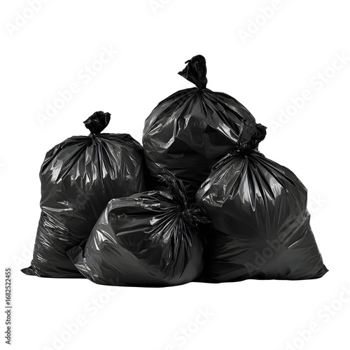 Isolated group of black plastic garbage bags against a dark background