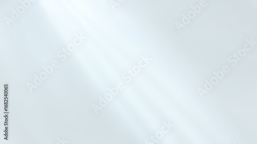 シャープな光筋が走るミニマルなライトグレー背景